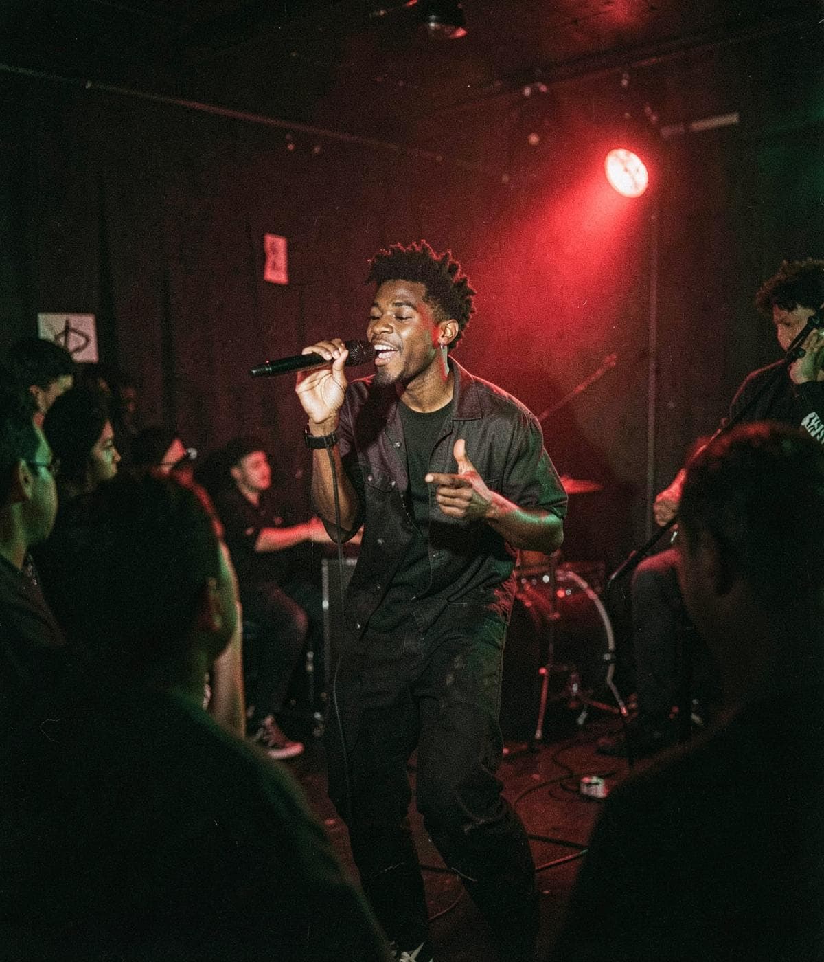 An emerging singer performing at an intimate live show